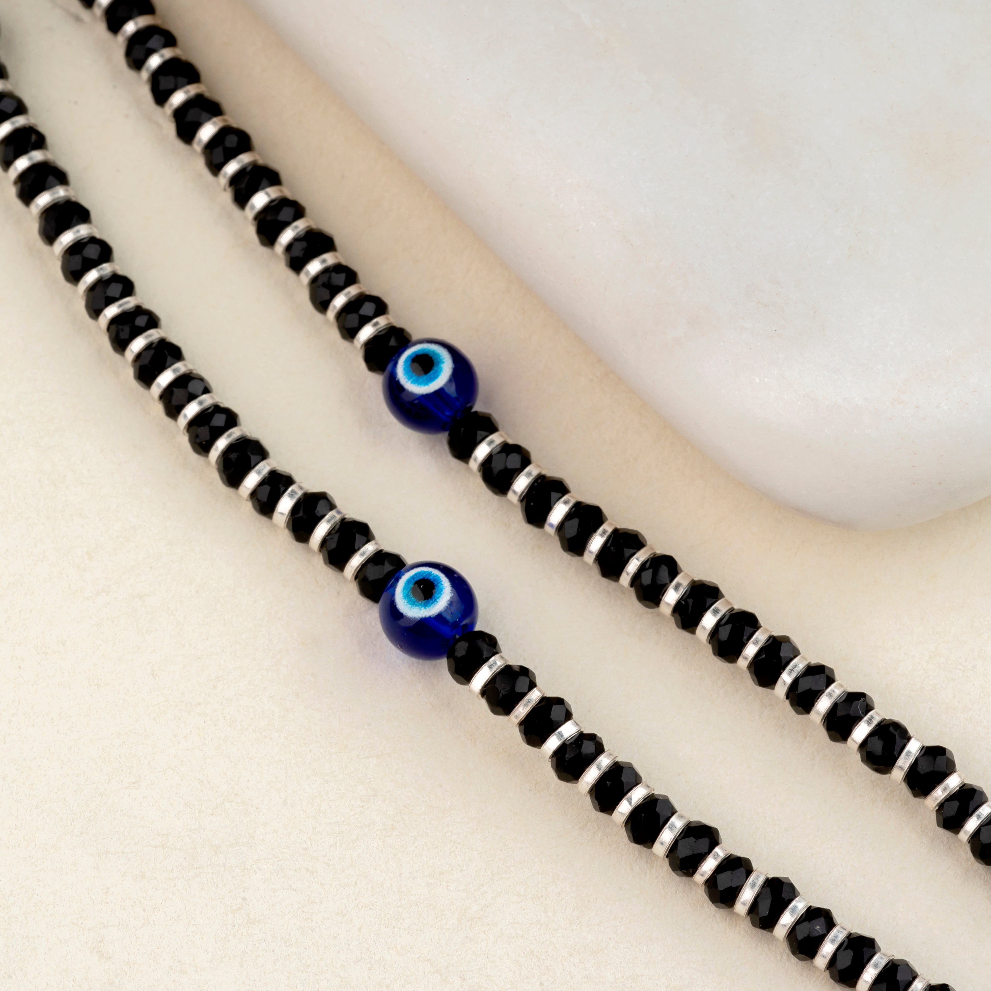 Buy quality silver evil eye kids black beads bracelet in Ahmedabad